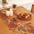Embroidered autumn maple leaf runner styled on a dining table; selected size may differ