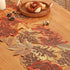Close view of autumn leaf stitching and shaped edges