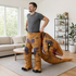 Adult stepping into the roomy inflatable T-Rex costume at home